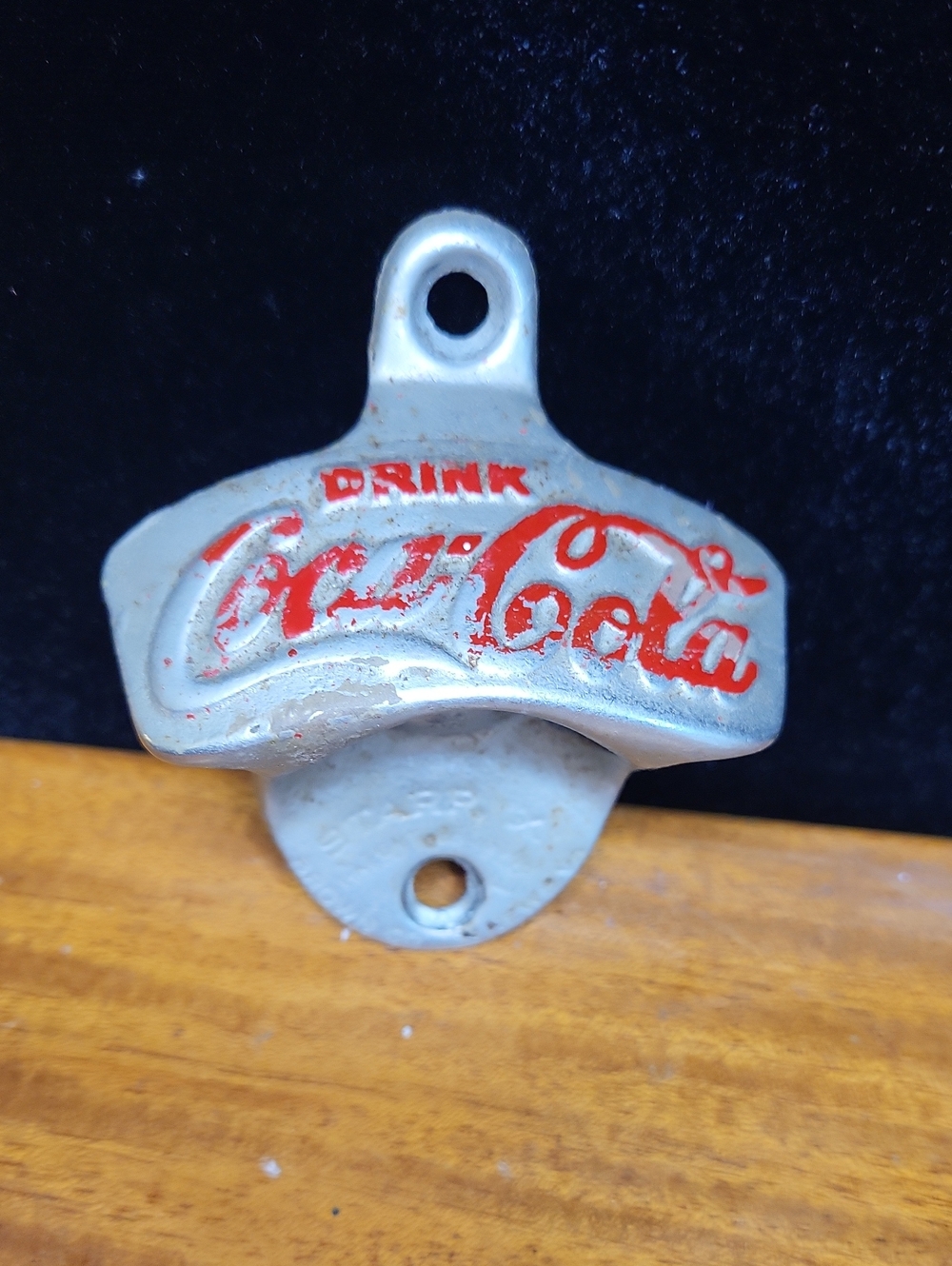 Coca-Cola Cream and Red Cast Metal Wall Opener
